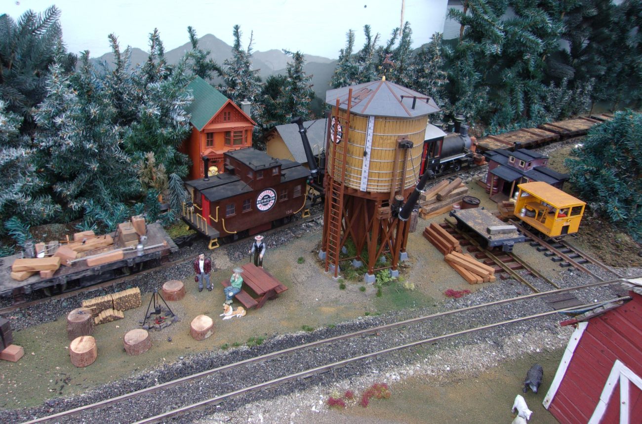 Diorama of track side camp opposite the Carlson farm diorama with water tower in place